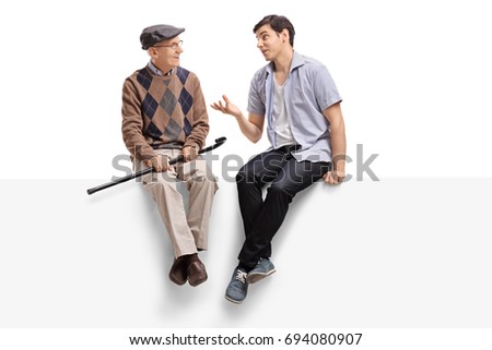 Similar – Image, Stock Photo Man sits on a white horse bridled with a bosal and looks for a carrot in his jacket pocket in thanks for the horse carrying him. In the background are blurred autumn trees.