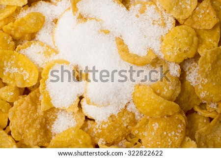 A close of of cornflakes with added sugar