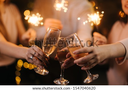 Similar – Image, Stock Photo Couple toasting with glasses of champagne in park