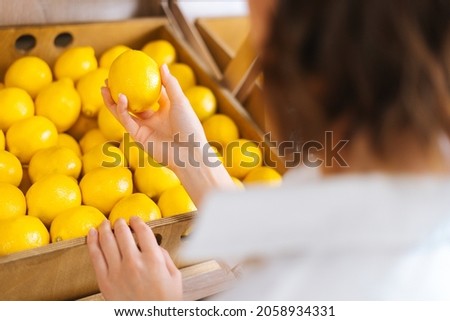 Similar – Image, Stock Photo Young Woman Holding Lemon Slices Over Eyes Smiling Widely