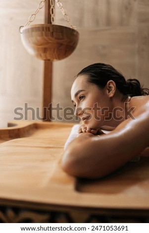 Similar – Image, Stock Photo Relaxed woman waiting for pressotherapy treatment at wellness center or clinic