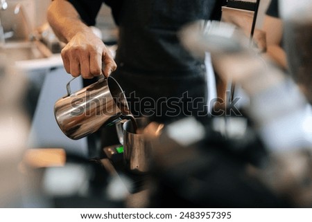 Similar – Foto Bild Crop Barista bereitet heißen Kaffee in einem Café zu