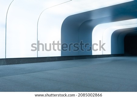 Similar – Image, Stock Photo Highway tunnel. Interior of urban tunnel without traffic in nught with blue lights. Rome, Italy