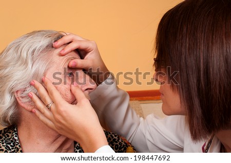 Senior medical check up with focus on eyes examination