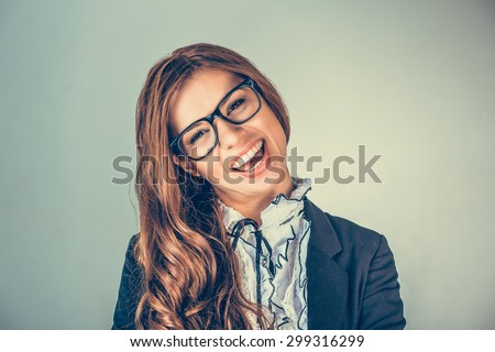 Portrait closeup of funny, excited joyful female, laughing business woman smiling girl wearing glasses looking at you isolated green background wall. Positive human emotion facial expression attitude