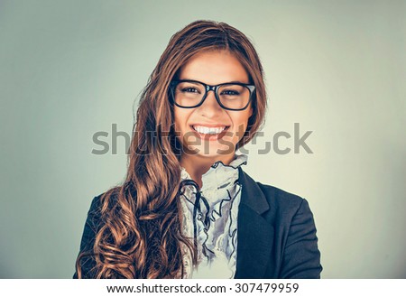 Success. Closeup portrait head shot sexy beautiful happy young woman with glasses smiling isolated on grey green background wall. Positive human emotion face expression feeling life perception concept