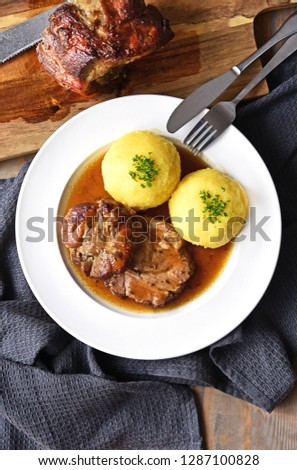 Similar – Foto Bild bayerischer Schweinebraten auf Holz