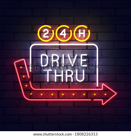 Drive thru neon sign. Glowing neon light signboard of fast food. Sign of drive thru with colorful neon lights isolated on brick wall. Vector illustration