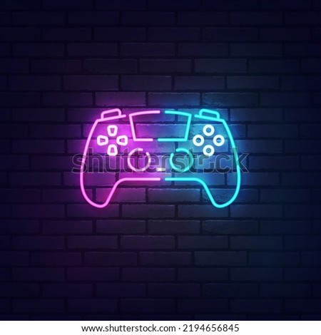 Gamepad neon sign, bright signboard, light banner. Game joystick logo neon, emblem. Vector illustration