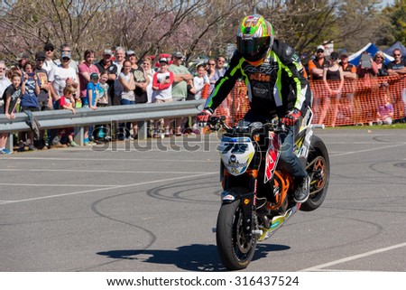 VICTORIA/AUSTRALIA - 13 SEPTEMBER 2015: Stunt motorcycle rider performing at a local car show on the 13 September 2015 in Corowa.
