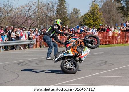 VICTORIA/AUSTRALIA - 13 SEPTEMBER 2015: Stunt motorcycle rider performing at a local car show on the 13 September 2015 in Corowa.