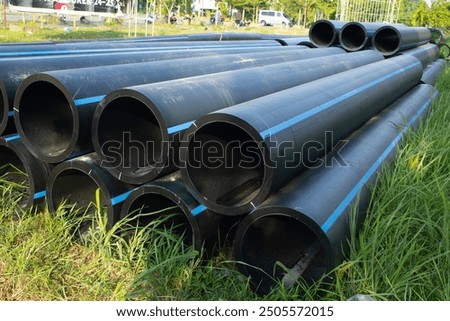 Similar – Image, Stock Photo A blue water pipe on a construction site