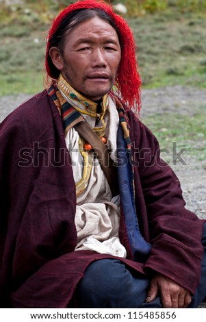 DHO TARAP, NEPAL - SEPTEMBER 11: An unidentified Tibetan man during the local Dho Tarap Full Moon Festival on September 11, 2011 in Dho Tarap Village, Dolpo district, Nepal