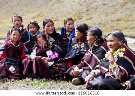 DHO TARAP, NEPAL - SEPTEMBER 11: Group of unidentified Tibetan women and girls posing for the photo during Full Moon Festival on September 11, 2011 in Dho Tarap Village, Dolpo district, Nepal