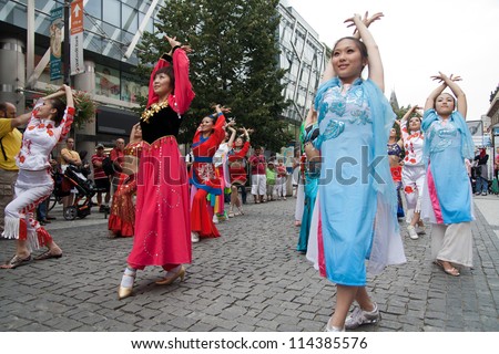 PRAGUE - AUGUST 26: Unknown people dance in traditional costumes at Folklore Festival Prague Fair, 25-30.8.2009, close to the Old Town Square  on August 26, 2009 in Prague, Czech Republic