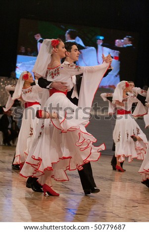 BUCHAREST - MARCH 14: Sport dance ensemble Codreanca, Chisinau of Moldova at IDSF Dance Masters, March 14, 2010, Bucharest, Romania
