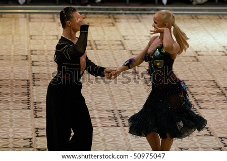 BUCHAREST - MARCH 14: Unidentified dance couple at IDSF Dance Masters on March 14, 2010 in Bucharest, Romania.