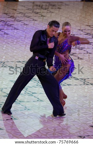 BUCHAREST - APRIL 17: Unknown latin dancers, competing at IDSF (International DanceSport Federation) Dance Masters on April 17, 2011 in Bucharest, Romania