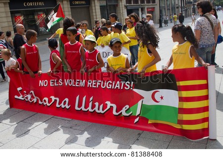 BARCELONA - JULY 18: Unknown people protesting against the political situation in Saharan region on July 18, 2011 in Plaça Catalunya, Barcelona, Spain