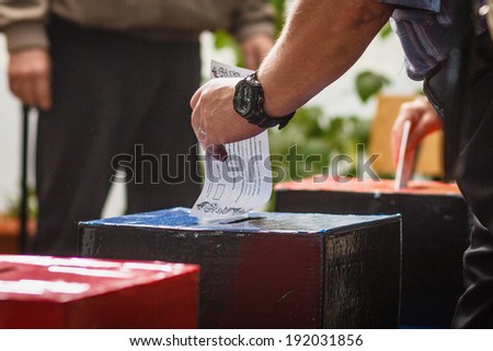 DONETSK, UKRAINE - MAY 11: People voting at one of the polling stations for independence referendum, on may 11, 2014 in Donetsk.