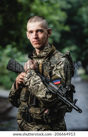 DONETSK, UKRAINE - JULY 07: One of the men from the Slovyansk on the central streets of Donetsk on july 07, 2014 in Donetsk.