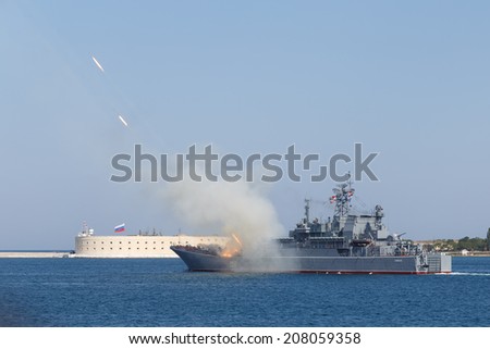SEVASTOPOL RUSSIA - JULY 28: artillery salute in the honor of the Day of the Navy on july 28, 2014 in Sevastopol, Crimea, Russia.
