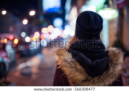 Similar – Image, Stock Photo Lonely woman (blurred) walking across the street