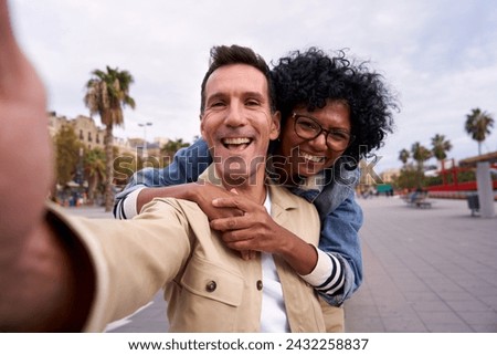 Similar – Image, Stock Photo Multiracial couple in the park