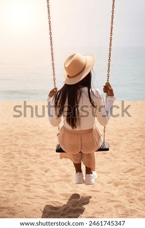 Similar – Image, Stock Photo Unrecognizable female traveler enjoying sunny day on rocky seashore