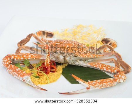 One steam Horse Crab seafood cuisine on white dish at the restaurant on isolated background