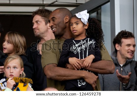 CARSON, CA - DECEMBER 1: Kobe Bryant and his daughter at the 2012 MLS Cup Final at the Home Depot Center on December 1, 2012 in Carson, California.
