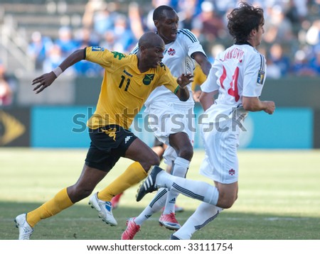 CARSON, CA. - JULY 3: Concacaf Gold Cup soccer match, Canada vs. Jamaica at the Home Depot center in Carson. Luton Shelton, Dejan Jakovic, and Atiba Hutchinson fight for the ball on July 3, 2009.