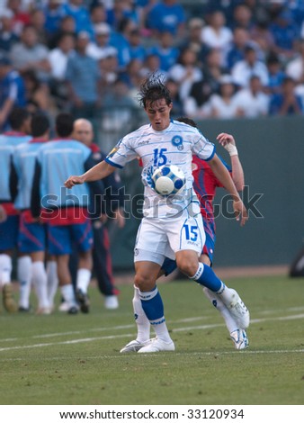 CARSON, CA. - JULY 3: Concacaf Gold Cup soccer match, Costa Rica vs. El Salvador at the Home Depot center in Carson. Alfredo Pacheco controlling the ball on July 3, 2009.