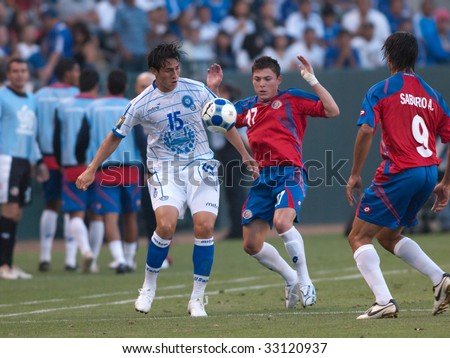 CARSON, CA. - JULY 3: Concacaf Gold Cup soccer match, Costa Rica vs. El Salvador at the Home Depot center in Carson. Alfredo Pacheco, Pablo Herrera and Alvaro Saborio fighting for the ball on July 3, 2009.