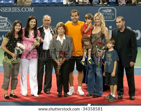 LOS ANGELES, CA. - JULY 27: Pete Sampras and family pose for photographers after his exhibition match at the L.A. Tennis Open July 27, 2009 in Los Angeles.