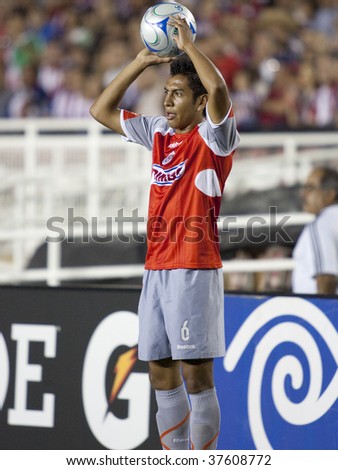 PASADENA, CA. - SEPTEMBER 23: Omar Esparza before throwing the ball into play during the Chivas USA vs. Chivas de Guadalajara exhibition match on September 23rd 2009 at the Rose Bowl in Pasadena.