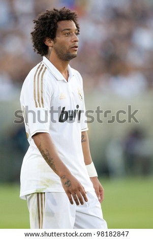 LOS ANGELES - JULY 16: Real Madrid C.F. D Marcelo #12 during the World Football Challenge game between Real Madrid & the Los Angeles Galaxy on July 16 2011 at the Los Angeles Memorial Coliseum in Los Angeles, CA.