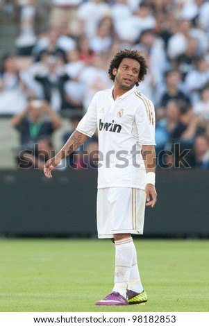 LOS ANGELES - JULY 16: Real Madrid C.F. D Marcelo #12 during the World Football Challenge game between Real Madrid & the Los Angeles Galaxy on July 16 2011 at the Los Angeles Memorial Coliseum in Los Angeles, CA.