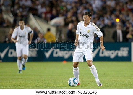 LOS ANGELES - JULY 16: Real Madrid C.F. M Mesut Ozil #23 during the World Football Challenge game on July 16 2011 at the Los Angeles Memorial Coliseum in Los Angeles.