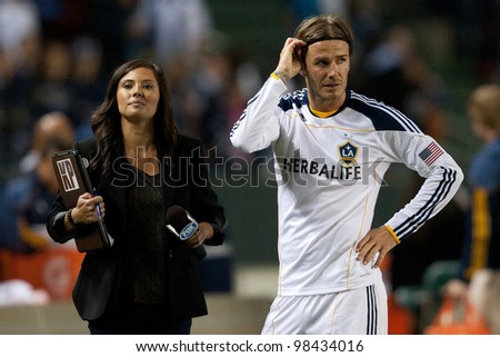 CARSON, CA. - MAY 14: Los Angeles Galaxy M David Beckham #23 getting interviewed by FOX Sports after the MLS game on May 14 2011 at the Home Depot Center.