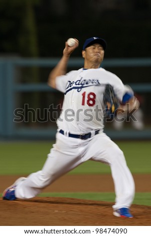 LOS ANGELES - AUG 8: Los Angeles Dodgers P Hiroki Kuroda #18 pitches during the MLB game on Aug 8 2011 at Dodger Stadium, in Los Angeles.
