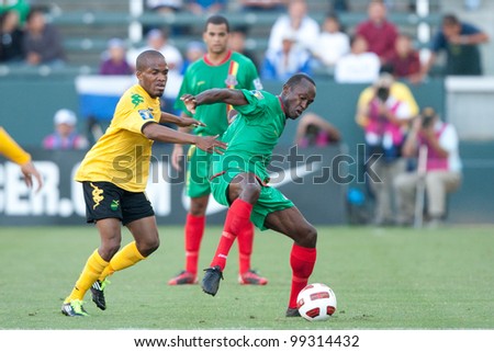 CARSON, CA. - JUNE 6: Jamaica player M Dane Richards #11 (L) & Grenada player M Ricky Charles #9 (R) in action during the 2011 CONCACAF Gold Cup group B game on June 6 2011 at the Home Depot Center in Carson, CA.