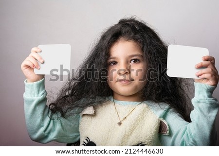 Similar – Image, Stock Photo little child holds two strawberries in his hands