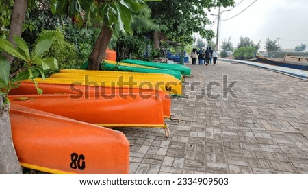 Similar – Image, Stock Photo Many canoes ready to go out