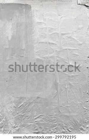 White textured grunge paper background with paint marks and rough marks