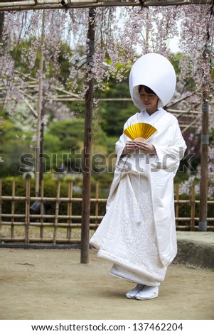 KYOTO, JAPAN-APRIL 12: Celebration of a typical wedding in Japan on April 12,2013 in Kyotoo, Japan.