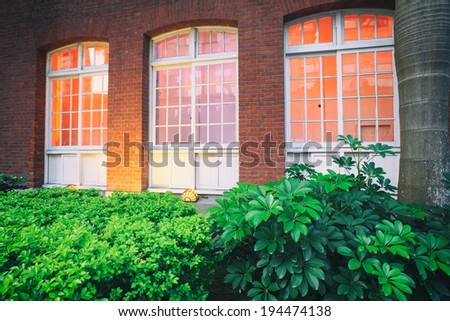 Colorful windows and detail on a colonial house in Taiwan