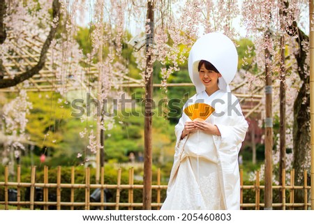 KYOTO, JAPAN-APRIL 12: Celebration of a typical wedding in Japan on April 12,2013 in Kyoto, Japan