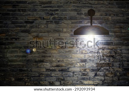 Old interior room with brick wall and three light spots for adv or others purpose use
