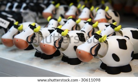 a herd of toy cows